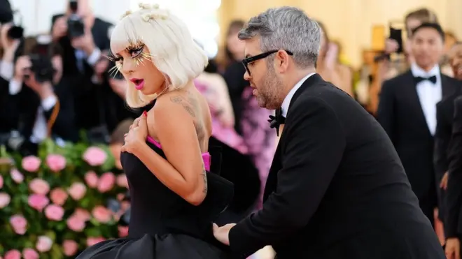 Designer Brandon Maxwell then undid this dress to reveal...