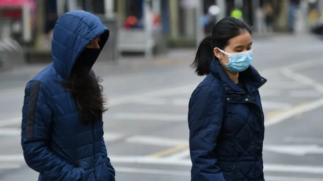 People wearing face masks in Melbourne, Victoria during lockdown