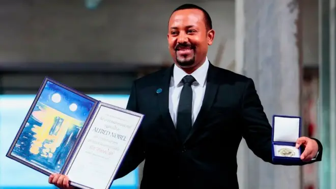 Ethiopia's Prime Minister and Nobel Peace Prize Laureate Abiy Ahmed Ali poses after he was awarded the Nobel Peace Prize during a ceremony at the city hall in Oslo on December 10, 2019