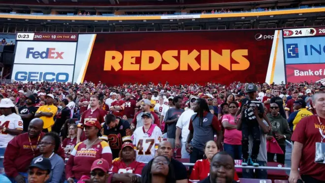 Redskins stadium sign next to FedEx logo