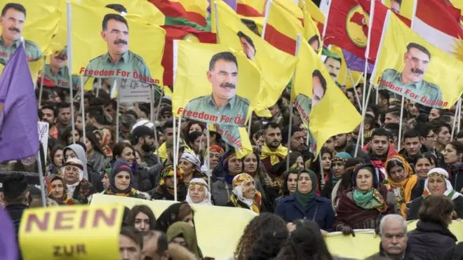 Kurdish demonstrators waved flags with portraits of detained PKK Leader Abdullah Ocalan