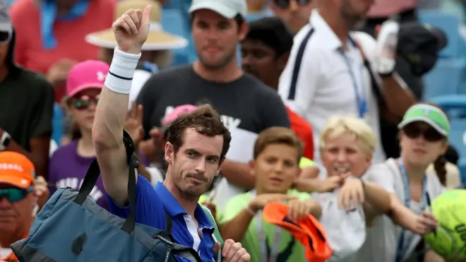 Andy Murray waves goodbye to the crowd after defeat to Richard Gasquet