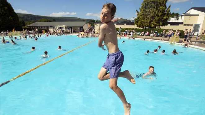 Outdoor pools, like the one in Ilkley, west Yorkshire, are in high demand this week