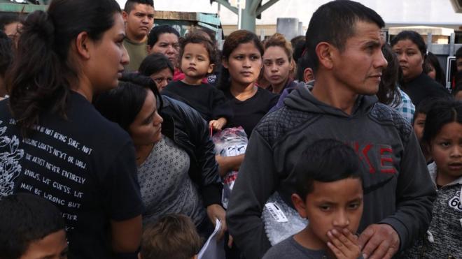 Undocumented immigrant families are released from detention at a bus depot in McAllen, Texas