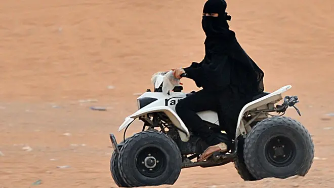 Saudi Arabia woman on top motorbike