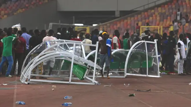 Two overturned dugouts at the Moshood Abiola National Stadium in Abuja