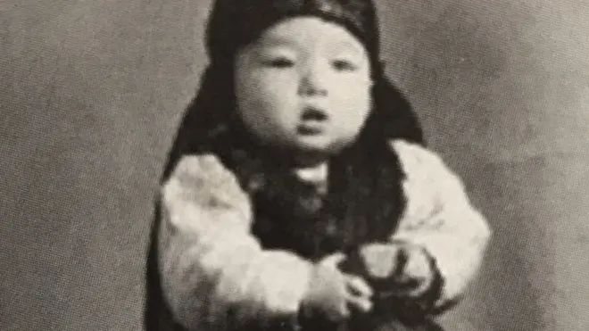 Lee Gyong-pil, who was at birth given the name Kimchi 5, was born onboard a cargo ship