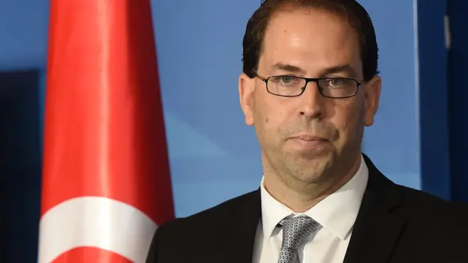 Youssef Chahed s'adressant à la presse après sa désignation au poste de premier ministre le 3 août 2016 à Tunis.