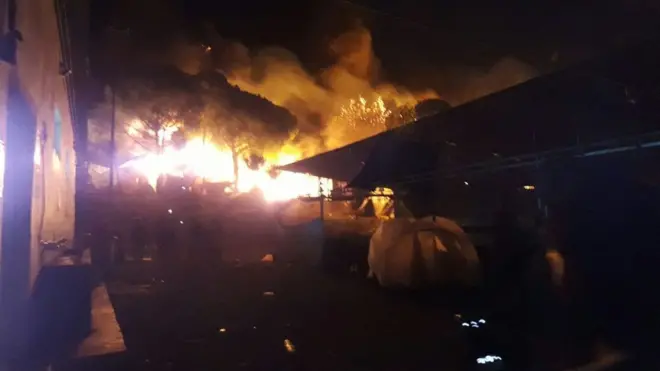 Large flames engulfed tents and prefabricated buildings in Moria camp