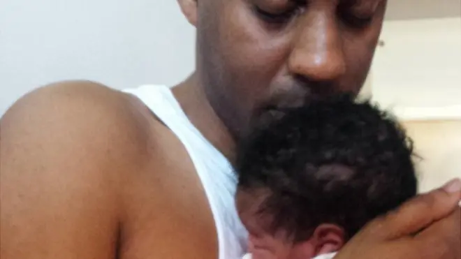 Elliott Rae y su hija