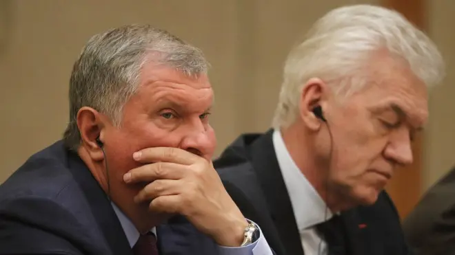 Под санкции попали в том числе Игорь Сечин (слева) и Геннадий Тимченко