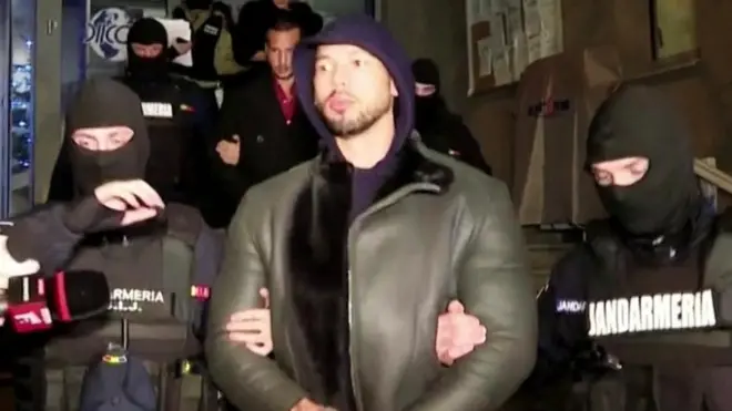 Controversial online influencer Andrew Tate is detained by Romanian police