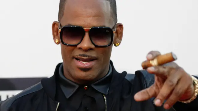 Singer R Kelly arrives at the 41st American Music Awards in Los Angeles, California November 24, 2013