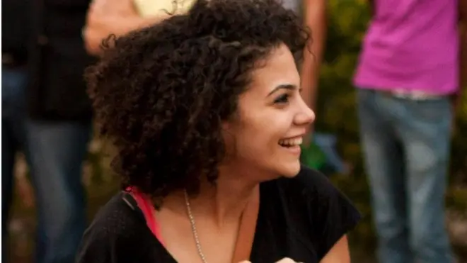 Eman El-Deeb was asked to straighten her hair nearly every day