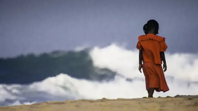 Girl walking in Arugambay