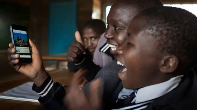 Boys wey dey smile at dia phone