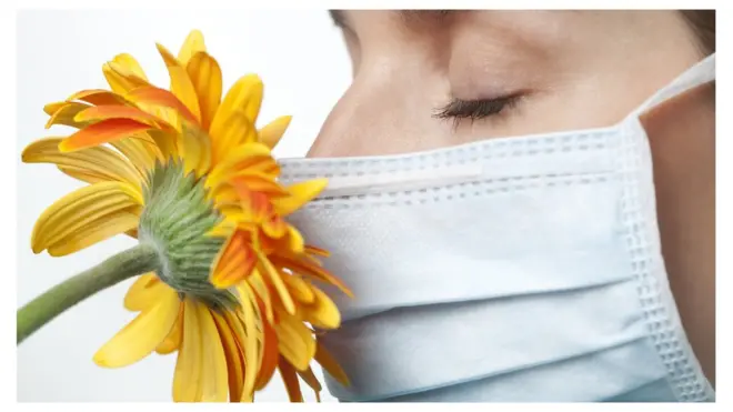 Woman wearing surgical mask