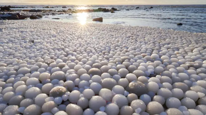 Picture by Risto Mattila of egg shaped balls on ice in Finland