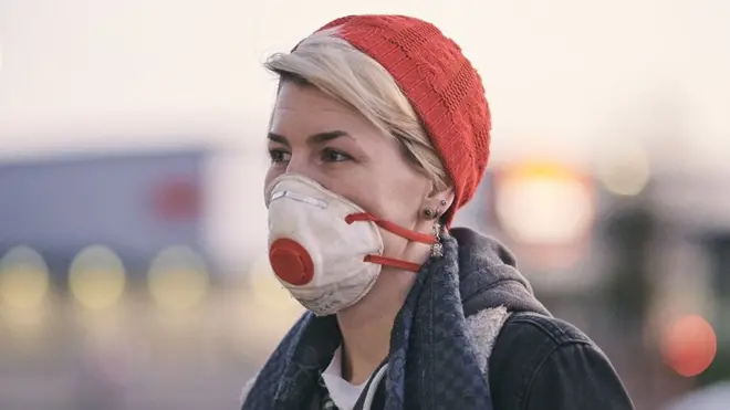 Woman wearing a mask