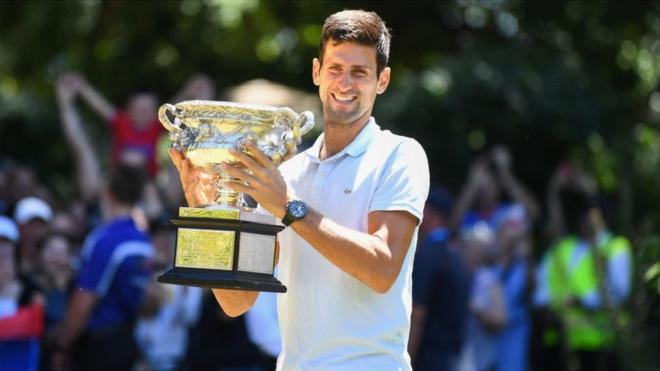 Djokovic with the Norman Brookes Challenge Cup after his victory in the 2019 Australian open