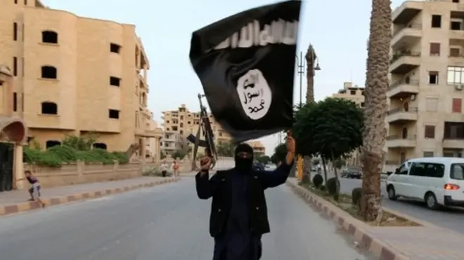 An IS member in Raqqa, Syria, in 2014