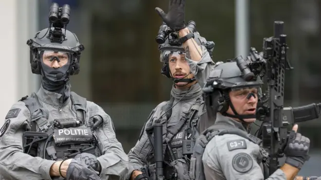 Police officers from the special intervention service stand outside the Erasmus MC Rotterdam hospital on Rochussenstraat,