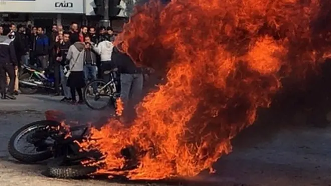 Iranian protesters in the streets following fuel price increase in the city of Isfahan, central Iran, 16 November 2019