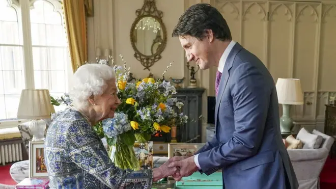 The monarch greeted Canadian Prime Minister Justin Trudeau with a handshake