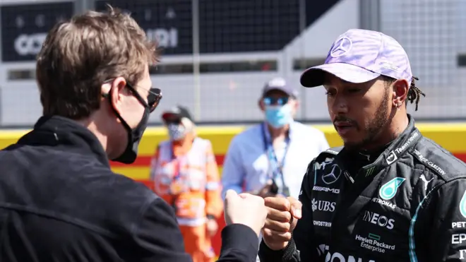 Tom Cruise cheered Lewis Hamilton on at the British Grand Prix in July