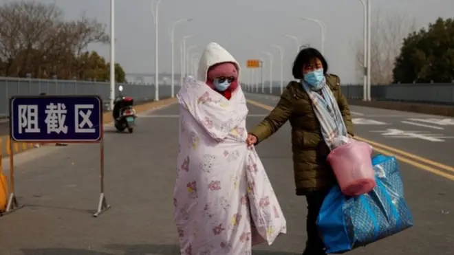 Mother and daughter at checkpoint