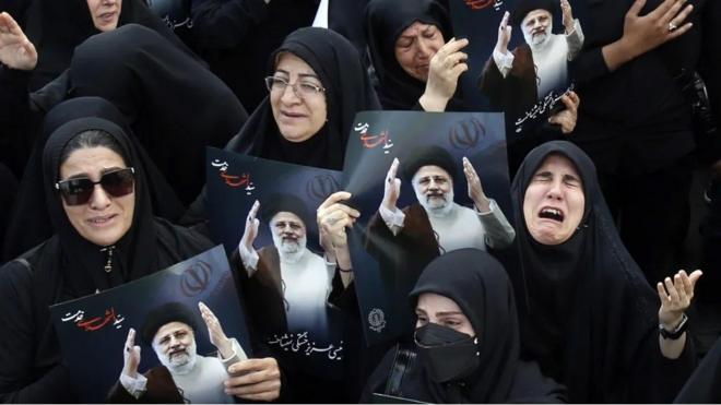 Some Iranians took part in a mourning ceremony for the late president in Tehran