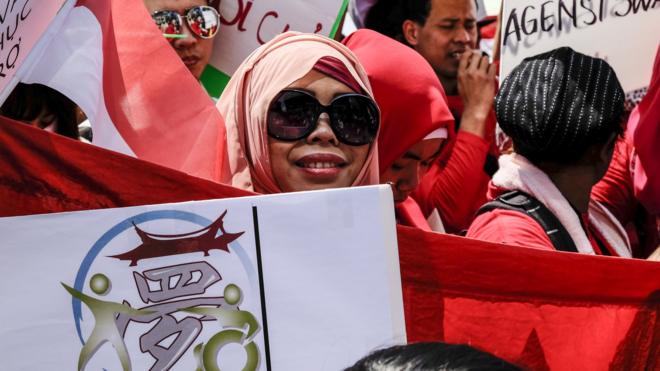 印尼外劳在台北参与争取劳工权益游行（资料图片）