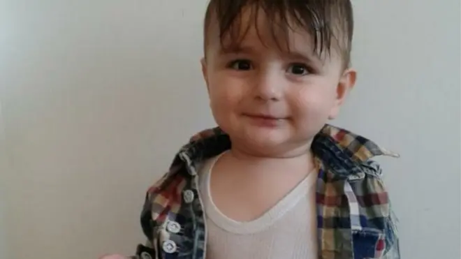 A friend of the family called 15-month-old Artin a "very happy baby"