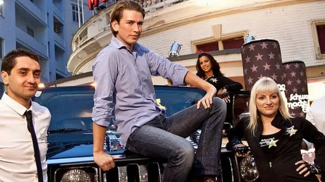 "Black is Cool": Sebastian Kurz (sitting, centre) in a campaign photo in 2011