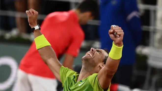 Rafael Nadal celebrates beating Novak Djokovic at 2022 French Open