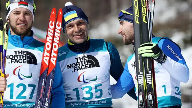 Віталій Лук'яненко (в центрі) і Анатолій Ковалевський (праворуч) після гонки на 7,5 км