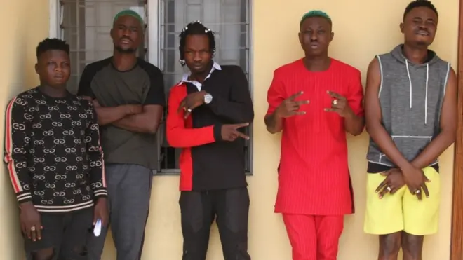 Zlatan Ibile wey wear red and Naira Marley wey dey third from left, na rising musicians for Nigeria