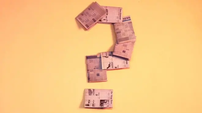 በጥያቄ ምልክት የተሰራ ጋዜጣ