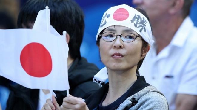 A fan waves the flag of Japan during day two of the ATP Cup tennis tournament at the RAC Arena in Perth, Australia, 04 January 2020.