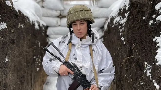 Maria is stationed on Ukraine's eastern front line. "We are standing our ground," she said