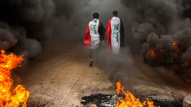 Irak'taki iki gösterici