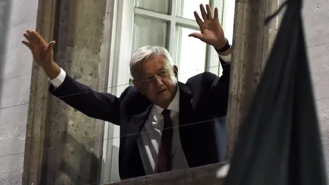 Presidential candidate Andres Manuel Lopez Obrador waves to supporters in Mexico City on July 1, 2018
