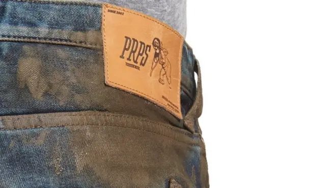 The mud-caked jeans being marketed by Nordstrom