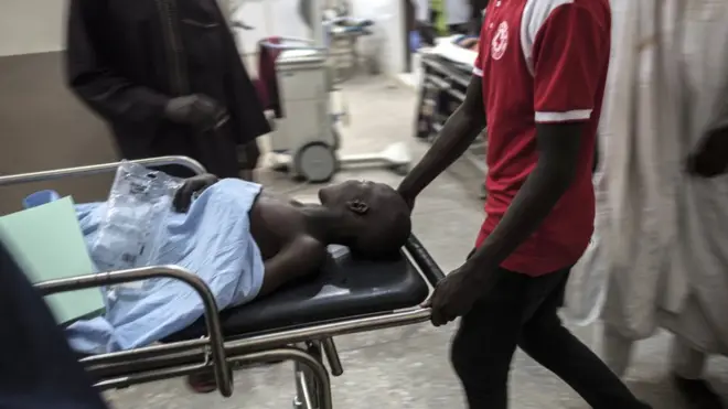 Sick person wey dey stretcher