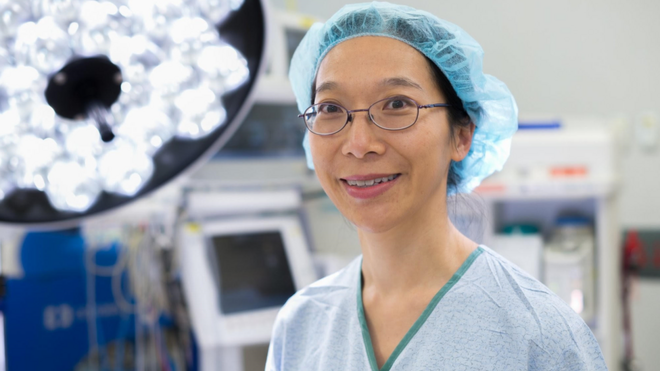 Dr Rhea Liang in an operating theatre