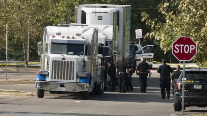 Officials tow a truck that was found to contain 38 suspected illegal immigrants in San Antonio, Texas, USA, 23 July 2017.
