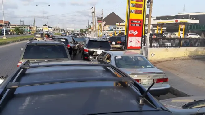 Long queue of cars for petrol filling stations