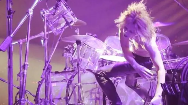 Yoshiki behind his drum kit