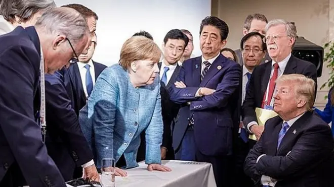 Donald Trump and G7 officials