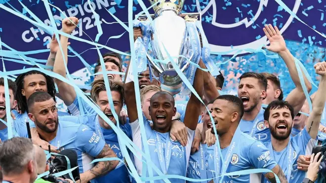 Manchester City with Premier League trophy
